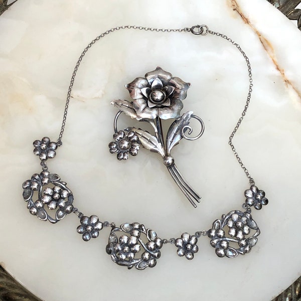 Lotto 2 spilla e collana con fiore in argento Sterling Enzell degli anni '50