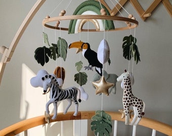 Baby safari mobile with rainbow and monstera leaves | Africa nursery felt giraffe lion zebra elephant сrib stars clouds