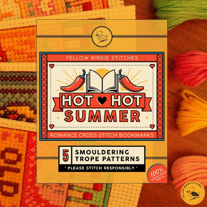 May include: A Yellow Birdie Stitches pattern booklet titled Hot Hot Summer featuring an illustration of an open book flanked by two red chili peppers. The cover includes the text 5 Smouldering Trope Patterns and Romance Cross Stitch Bookmarks.