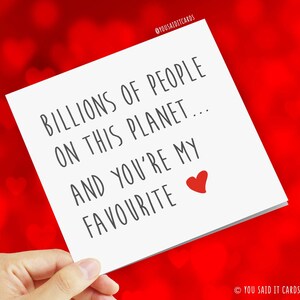 May include: A white card with black text that reads "Billions of people on this planet... and you're my favourite" with a red heart.