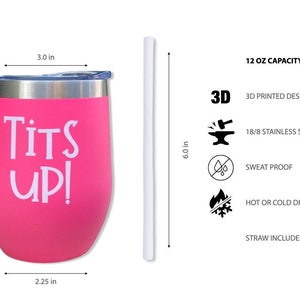 May include: A pink insulated tumbler with a silver rim and lid, featuring the text "Tits Up!" in white. The tumbler is 4.5 inches tall, 3 inches wide, and 2.25 inches deep. It includes a white straw and is designed for hot or cold drinks.
