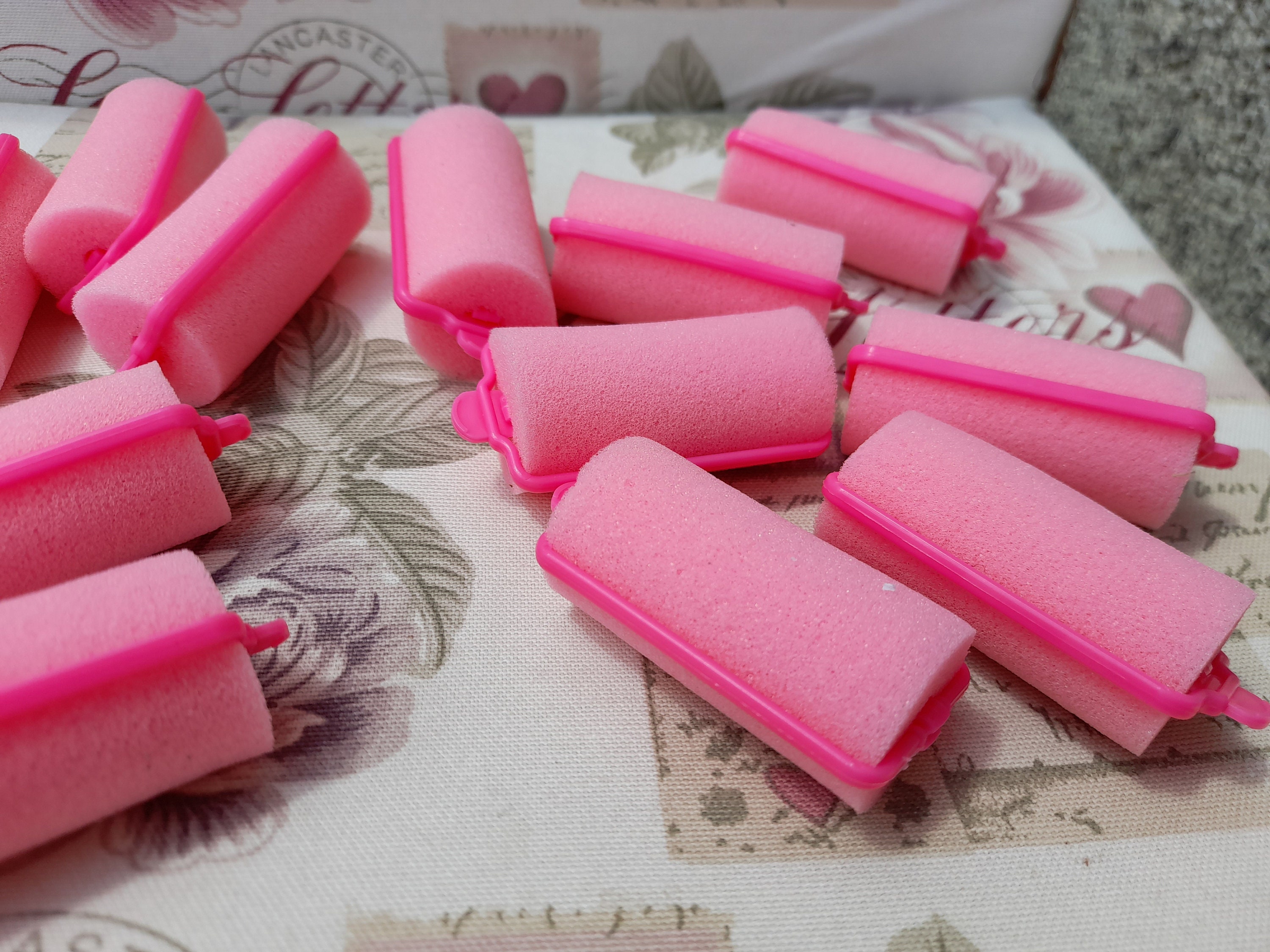 Pink top rollers hair