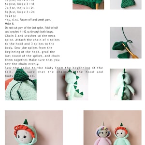 May include: Two crocheted dolls wearing green and pink dinosaur costumes. The dolls have red hair and are standing on a light pink surface. The dolls are wearing a green and pink dinosaur costume with a green tail and a green hood. The dolls are wearing a green and pink dinosaur costume with a green tail and a green hood.