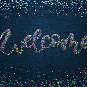 May include: The word "welcome" spelled out in colourful confetti on a dark blue background.