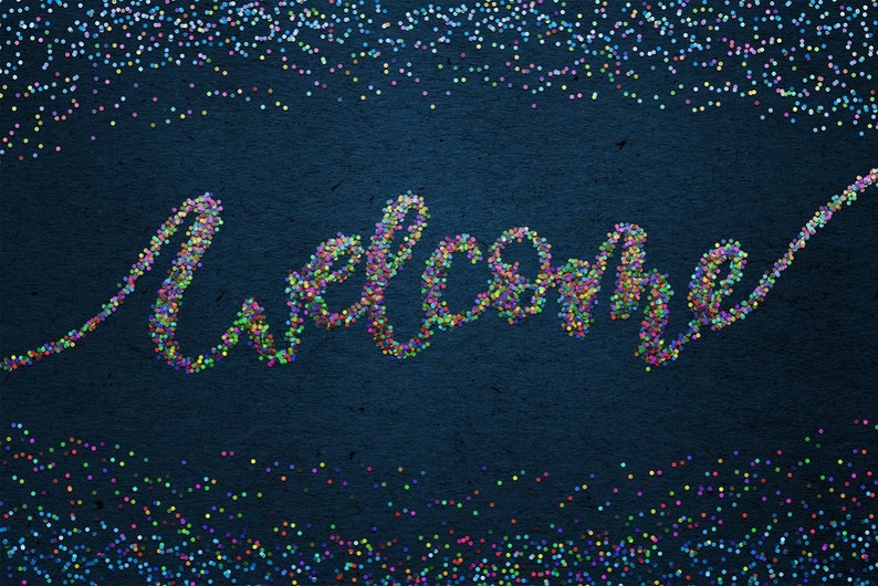 May include: The word "welcome" spelled out in colourful confetti on a dark blue background.