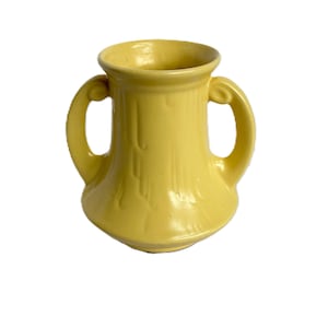 May include: A handmade wooden sign with the word "Welcome" in a whimsical font. The sign has a distressed white background and a dark brown frame, ideal for a front door or hallway. The sign measures approximately 30 cm wide and 15 cm tall.