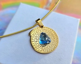 Amuleto di protezione VALKNUT ANDARA | Acciaio inossidabile | Nodo vichingo per coraggio e forza | con cristallo grezzo Andara/oro | 5D+++++