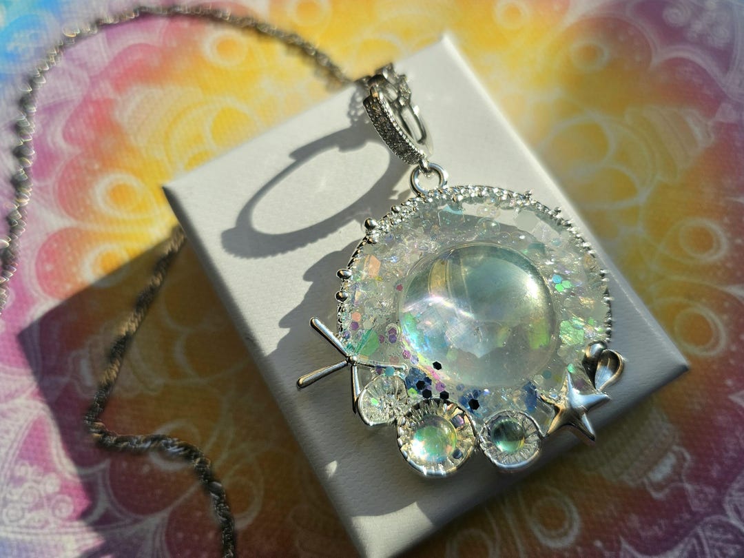Good Shell Amulet SEA LIGHT by LEMURIA Shell Amulet | Silver | With Sparkling Andara ...