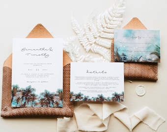 May include: Wedding invitation suite with a tropical theme. The invitation features a watercolor illustration of palm trees and a blue and green sky. The RSVP card has a similar design and includes a space for guests to indicate their attendance. The details card provides information about the wedding ceremony and reception.