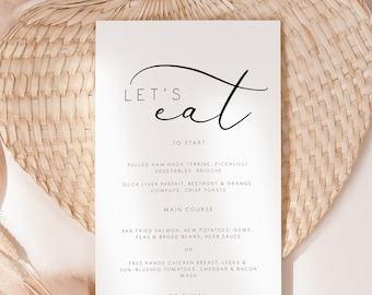 Puede incluir: Una tarjeta de menú de boda imprimible con un diseño minimalista. La tarjeta presenta un fondo blanco con texto negro y una fuente de escritura a mano. El menú incluye un título "Let's Eat", seguido de una lista de platos para la recepción de la boda. La fecha de la boda se indica en la parte inferior de la tarjeta.