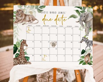 May include: A white printable sign with a jungle theme for a baby shower. The sign has a calendar with the text "Guess Baby Jones' due date" and a gold heart with the text "due date" in the center. The calendar has a giraffe, lion, elephant, zebra, and monkey illustrations.