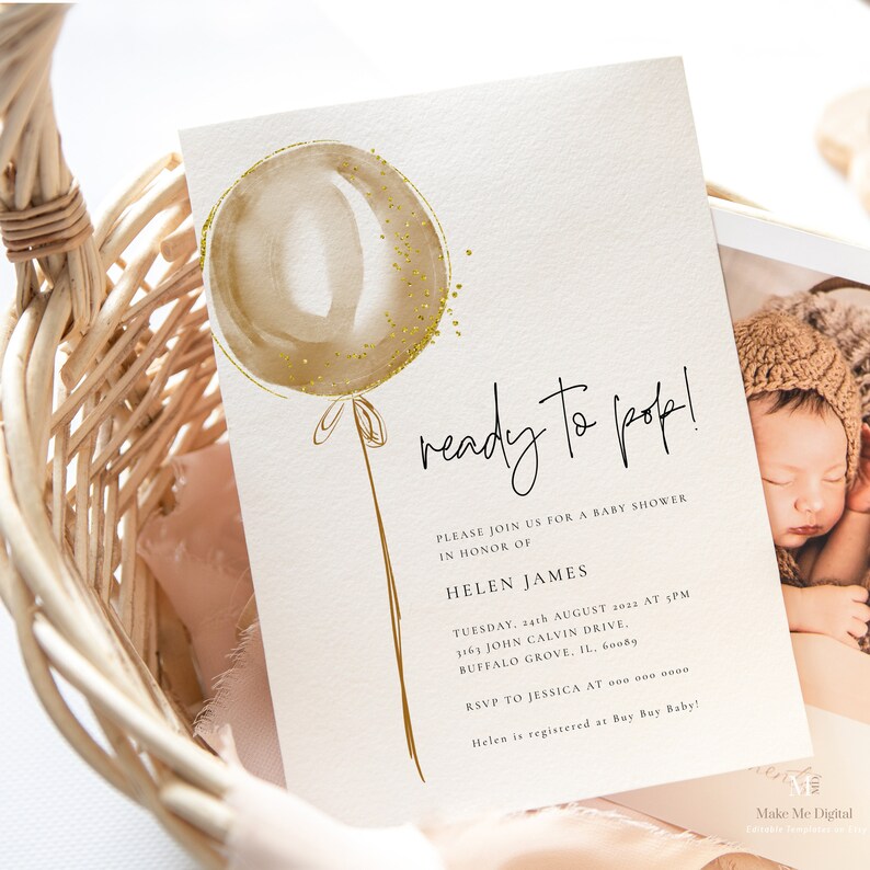 May include: A beige and gold balloon with gold glitter on a white background. The text "ready to pop!" is written in black cursive. The text "Please join us for a baby shower in honour of Helen James" is written in black. The text "Tuesday, 24th August 2022 at 1pm 3163 John Calvin Drive, Buffalo Grove, IL, 60089" is written in black. The text "RSVP to Jessica at 000 000 0000 Helen is registered at Buy Buy Baby!" is written in black.