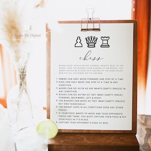 May include: A printable sign with instructions for playing chess. The sign has a black and white chessboard design with a white background and black text. The text includes the rules of chess and how to set up the board.