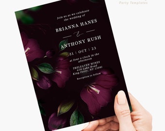 May include: A dark purple wedding invitation with floral accents. The invitation reads "Join us as we celebrate the wedding of Brianna Hanes & Anthony Rush 31 | Oct | 23 at four o'clock in the afternoon Treleaven Wines 658 Lake Road King Ferry, NY 13081 Reception to follow"