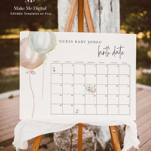 May include: A white printable sign with a calendar for guests to guess the baby's birth date. The sign has a watercolor illustration of balloons in pink, blue, and gold with gold glitter. The text on the sign reads "Guess Baby Jones' birth date".