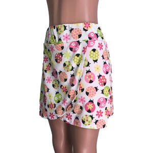 Pinks and Green Tones of Ladybugs:  Wrap Golf / Running / Pickle ball Skirt with Attached Short (Skort)