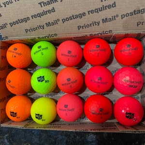 Used WILSON  / STAFF GOLF Balls Colors - 3 Orange, 9 Pinky/Red and 3 Yellow - Minor wear 15 golf balls total