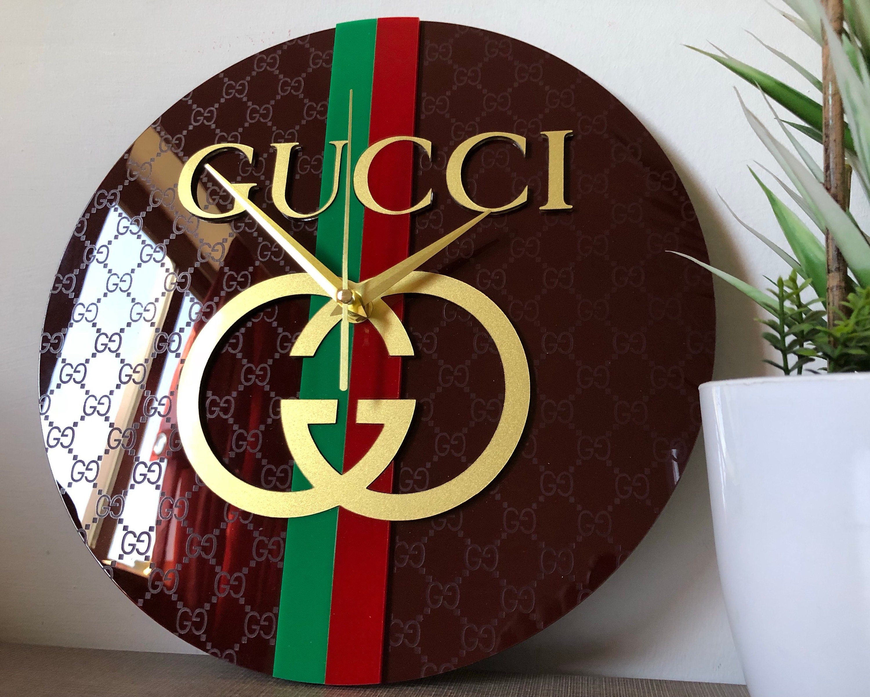 Gucci знак