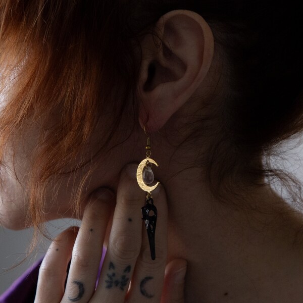 black and gold raven skull earrings