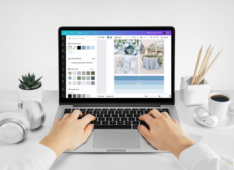 May include: A person using a laptop computer to create a wedding mood board. The screen shows a collage of images with a color palette of blue and gray. The laptop is on a white desk with a plant, headphones, and a cup of coffee.