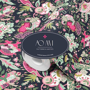 May include: A seamless pattern featuring a repeating design of pink, green, and white floral motifs on a dark blue background. The pattern is displayed on a roll of fabric with a label that reads "AOMI PATTERNS & MOTIFS TASHISTUDIO.ETSY.COM".