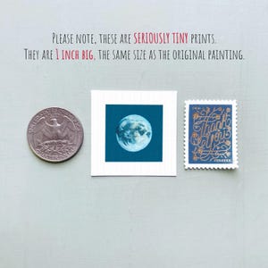 three small prints: a quarter, a square print with a moon image, and a postage stamp.