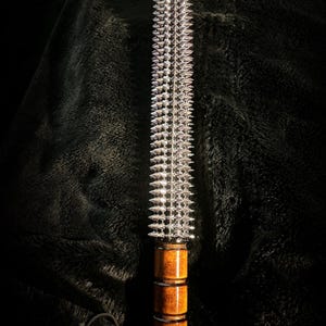 Spiked thumper