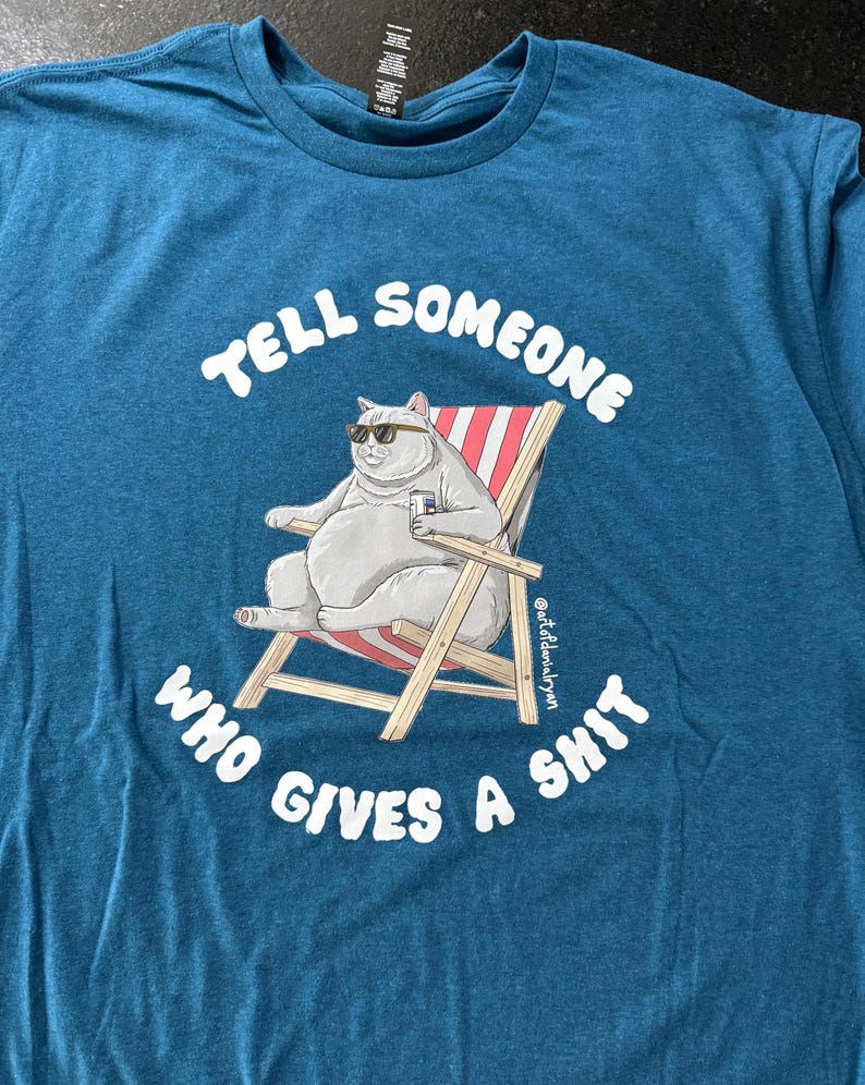 Tell Someone Who… - Turquoise T-shirt image 1