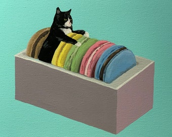 May include: A black and white cat sitting on top of a stack of colorful macarons in a light pink box.