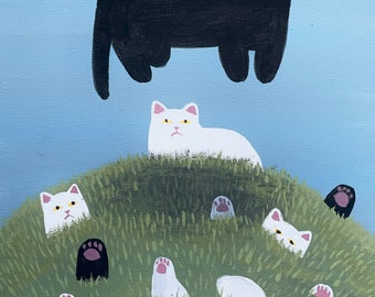 May include: A black cat floats above a green grassy hill with white cats and black cat paws peeking out from the grass.