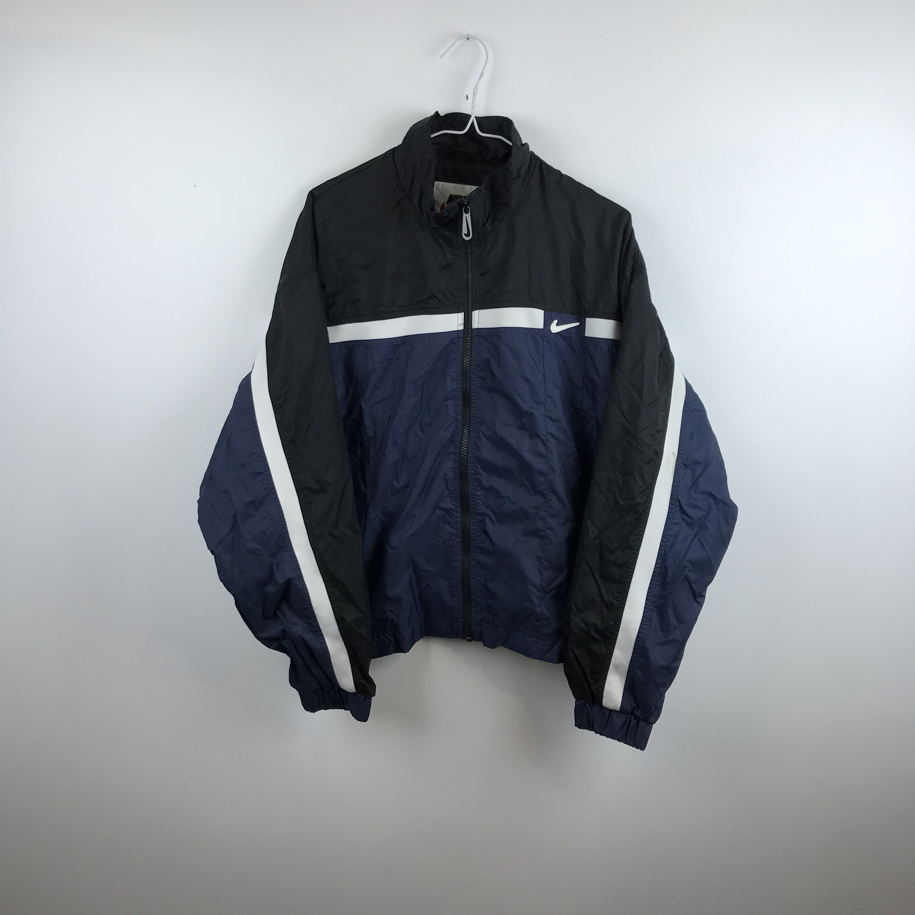 light blue and white nike windbreaker