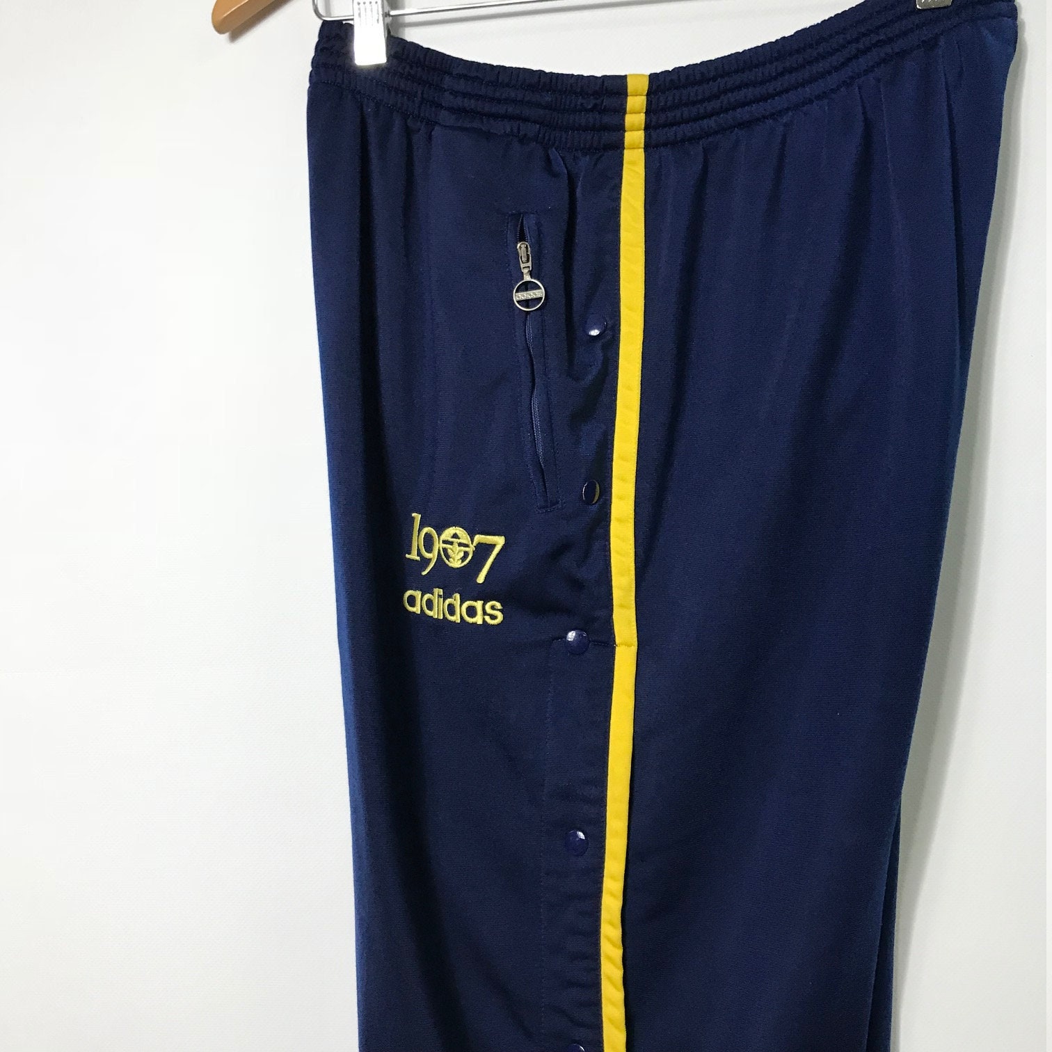 blue yellow track pants