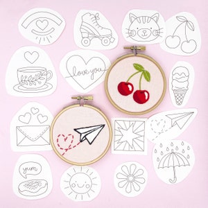 14 Iron on Embroidery Transfers. 14 cute doodle themed modern embroidery patterns. Simply Press onto fabric with a hot iron and sew.