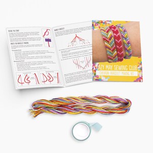 DIY friendship bracelet kit contents: embroidery thread, step-by-step instructions, and crafting supplies. A fun and easy craft gift idea.