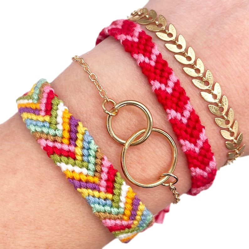 A mix of handmade friendship bracelets with a gold infinity bracelet. A creative and colourful DIY jewellery making kit gift.