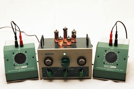A hand-built 'rat rod' Bluetooth Hi-Fi amplifier that looks like it rolled out of a steampunk garage — exposed hardware, industrial materials, one-of-a-kind audio art.