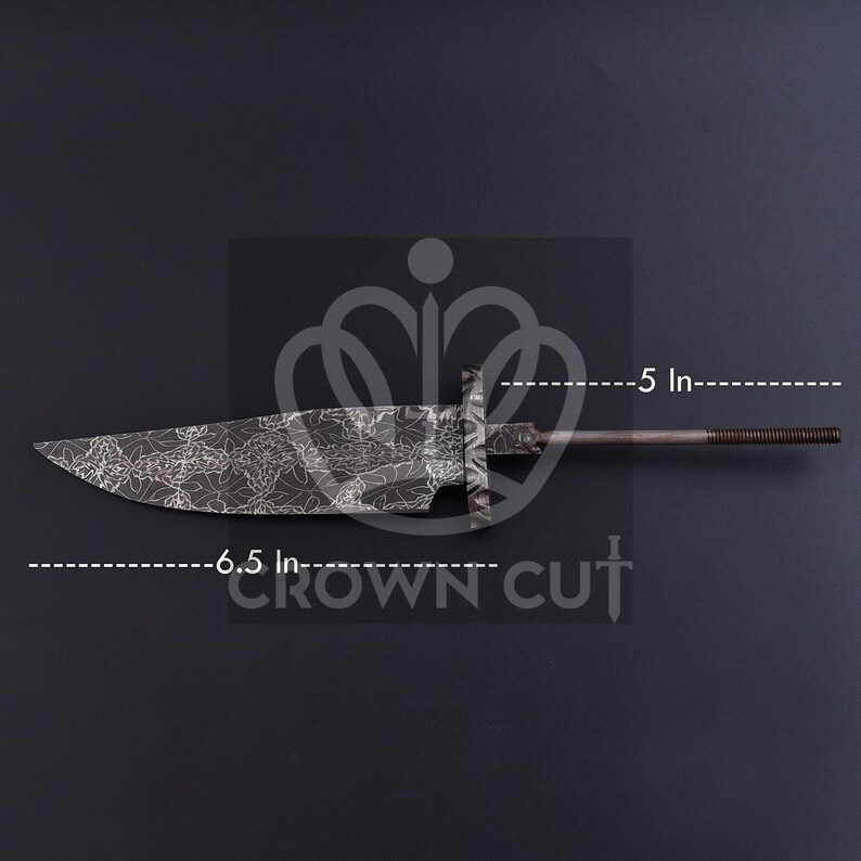 May include: A dark metal knife blade with a floral pattern, measuring 6.5 inches long. The handle is 5 inches long. The text "CROWN CUT" is visible. The knife is set against a dark background.