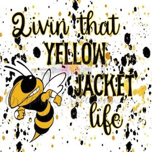 May include: A graphic design featuring a cartoon yellow jacket bee with a smiling face, black and yellow stripes, and white wings. The text "Livin' that YELLOW JACKET life" is in black and gold, with black and gold paint splatters on a white background.