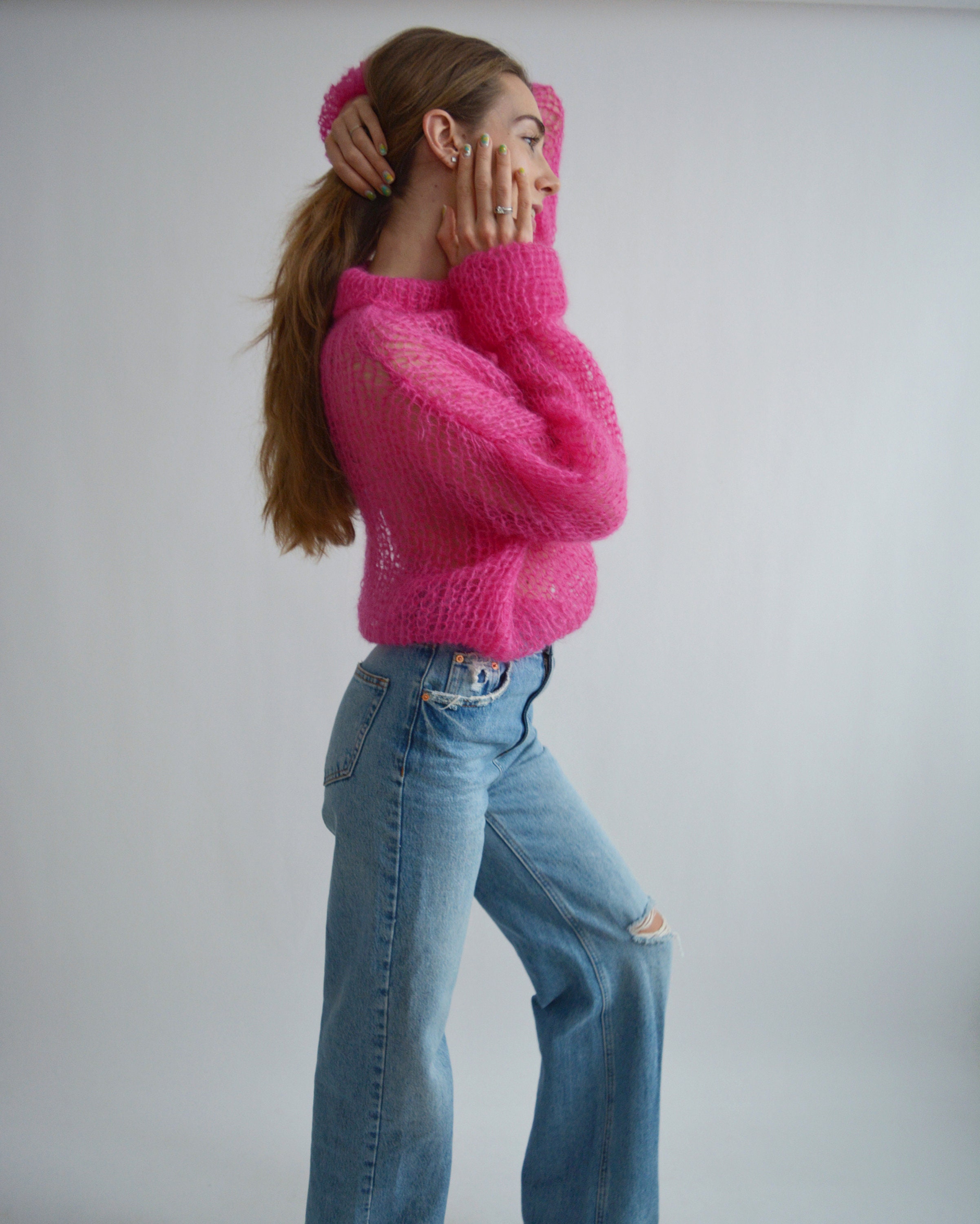 bright pink turtleneck