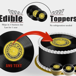 May include: Edible cake toppers shaped like black vinyl records with a yellow label that says "Still Rockin' at 85" and "Happy Birthday Danny". The toppers are shown on a black cake with white frosting and on cupcakes.