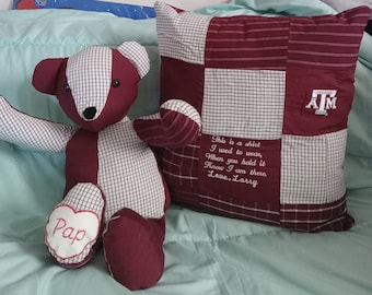 May include: A maroon and white plaid teddy bear with a heart-shaped patch that says "Pap" on one foot. The bear is sitting next to a maroon and white plaid pillow with the letters "ATM" embroidered on it. The pillow also has a message embroidered on it that says "This is a shirt I used to wear, When you hold it Know I am there. Love, Larry."