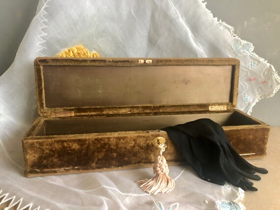 Antique and elegant jewelry box, velvet glove box