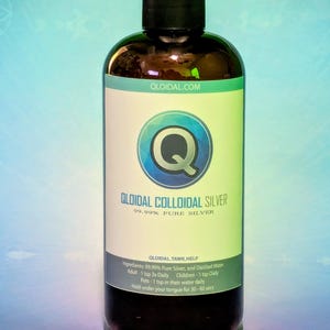 May include: A brown bottle of QLOIDAL COLLOIDAL SILVER with a black cap. The label features a blue and green design with the letter "Q". The text on the label includes "99.99% Pure Silver" and instructions for use.