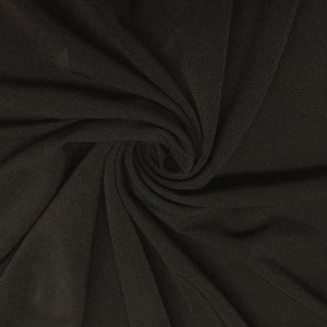 May include: Black ribbed fabric with a soft, smooth texture. The fabric is draped and folded, showing its flexibility and drape.