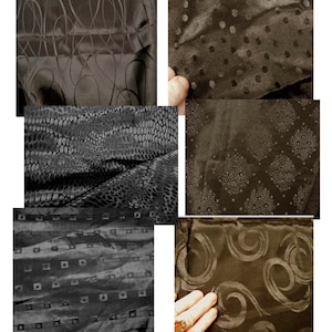 May include: Six different samples of brown fabric with various embossed patterns. The patterns include swirls, dots, squares, and a snake skin pattern.