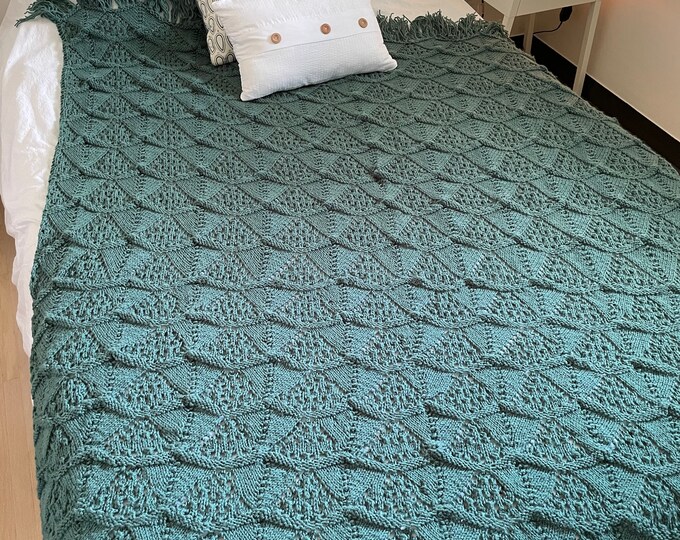 Handmade Crocheted scalloped pattern teal afghan with fringe.