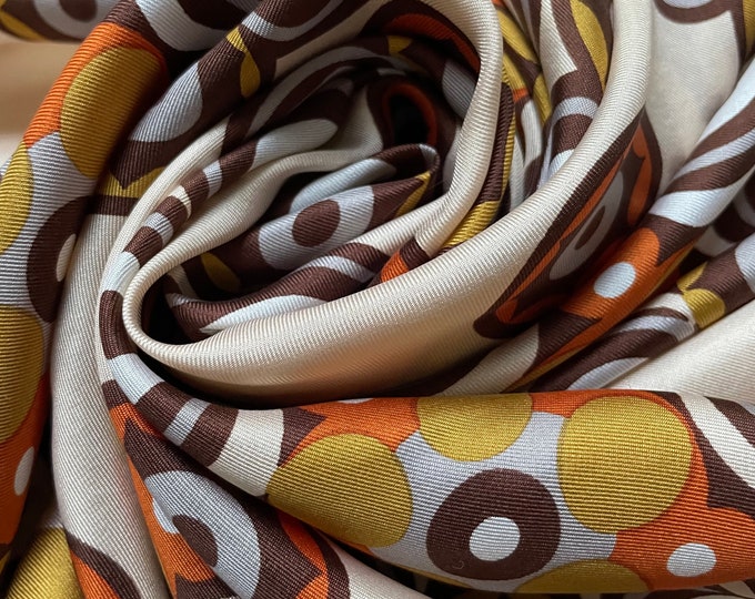 Jean Jardin100% silk scarf. Mod design in gold, orange, grey & brown