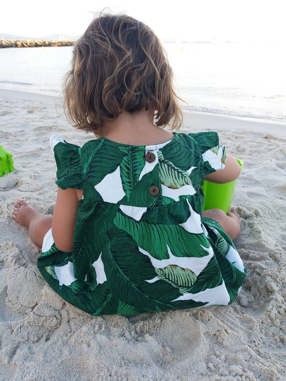 green and white print dress