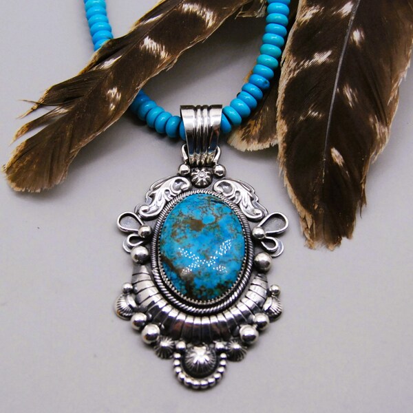 Handcrafted by Eli Gofman sterling silver and old stock Kingman turquoise  artisan pendant