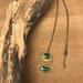 bronze and green fir necklace.
